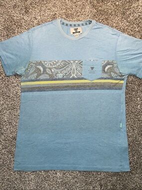 VISSLA Light Blue Short Sleeve Crew with Printed Chest Panel.  Size Medium.